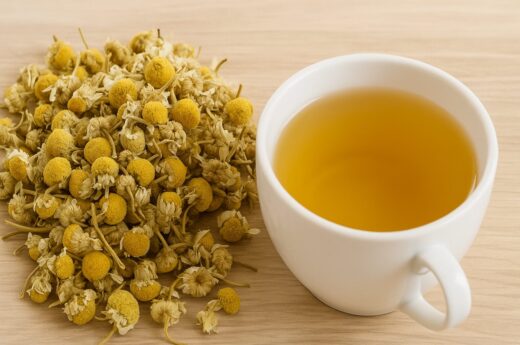 A warm cup of chamomile tea with dried flowers—natural remedy for sleep and digestion.